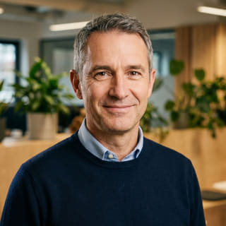 Headshot of James Mitchell, identified as Chief Executive Officer of Wveltrion