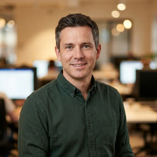 Headshot of Daniel Carter, identified as Chief Technology Officer of Wveltrion